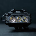 Load image into Gallery viewer, A black VECTOR ballistic shield light with spot optics
