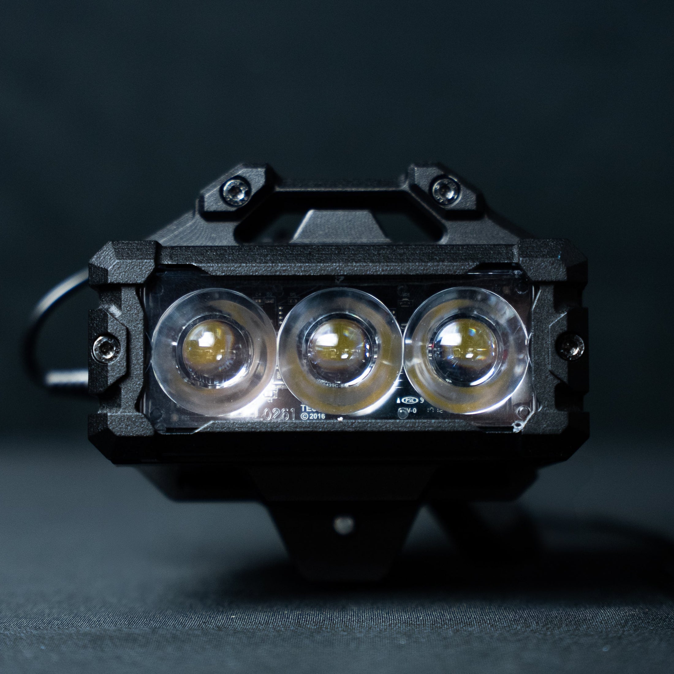 A black VECTOR ballistic shield light with spot optics